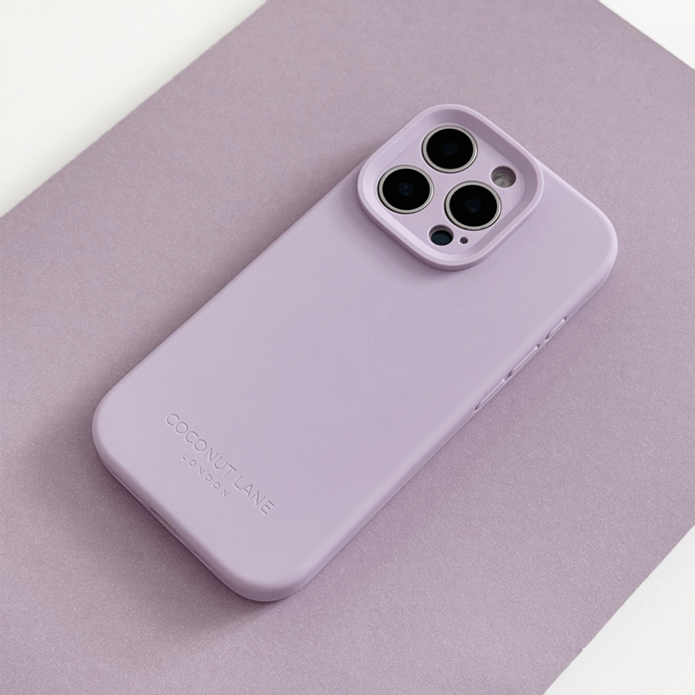 Lilac Phone Case with 'Coconut Lane' branding on a pink background.