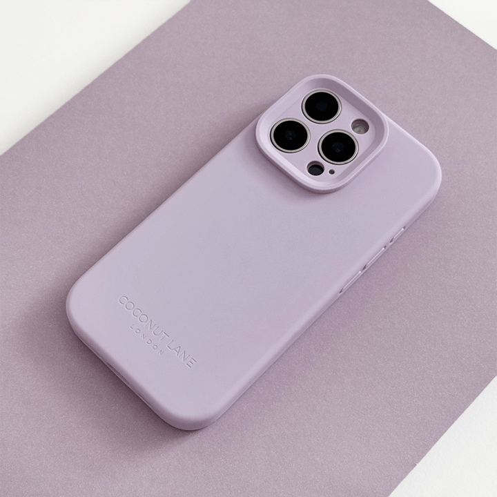 Lilac Phone Case with 'Coconut Lane' branding on a pink background.