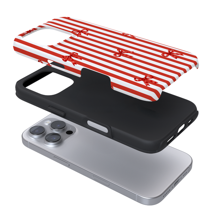 Red and white candy cane stripes with red bows.