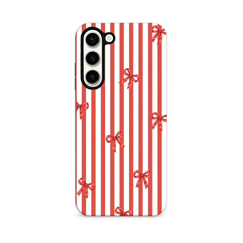 Red and white candy cane stripes with red bows.