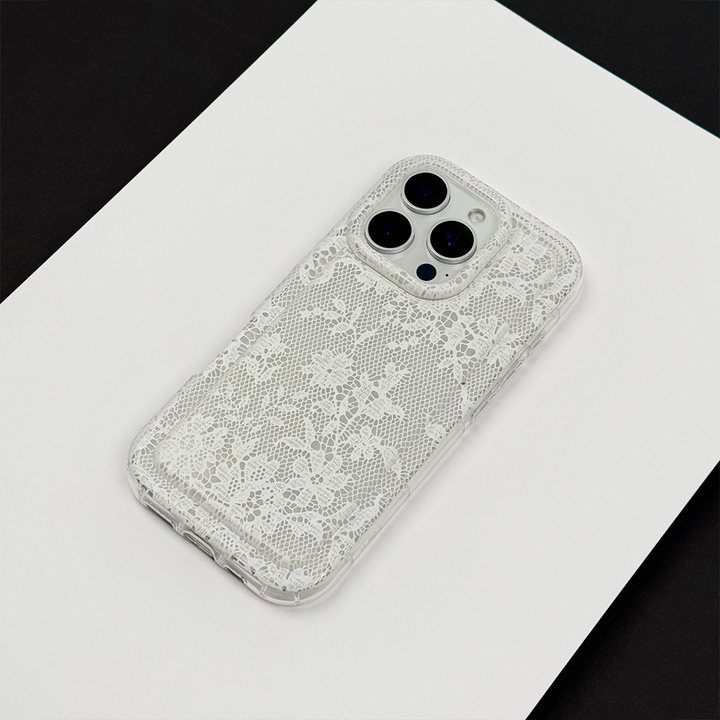 Clear Phone Case with lace design on a white surface.