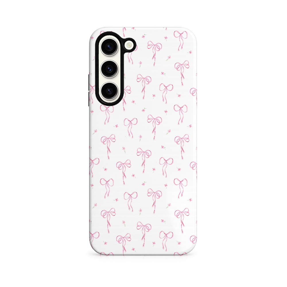 Phone case with pink bow pattern on a white background