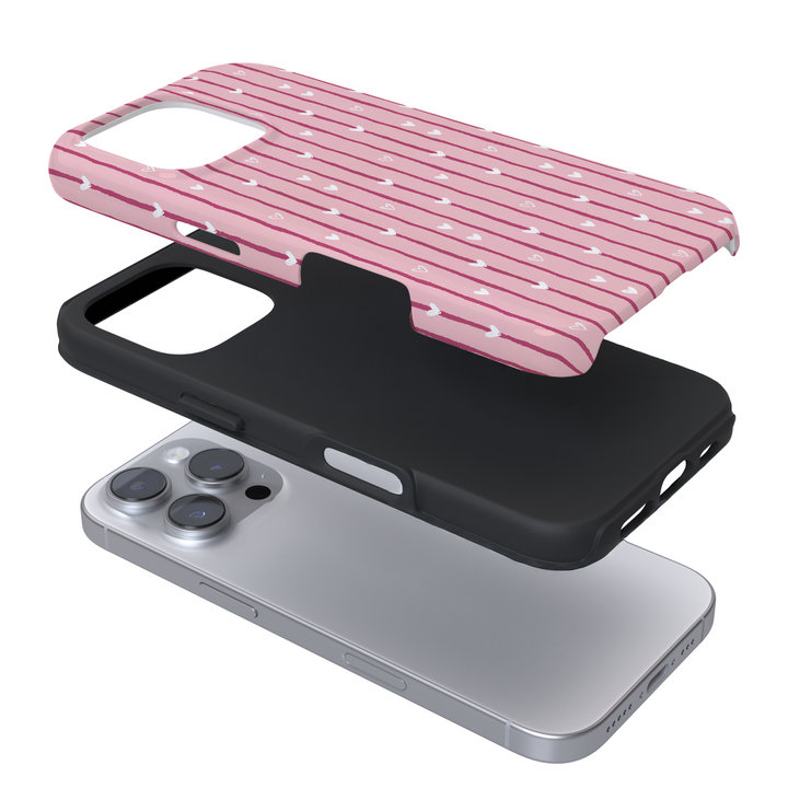 Expanded view of a pink phone case with a red striped heart pattern on a white background