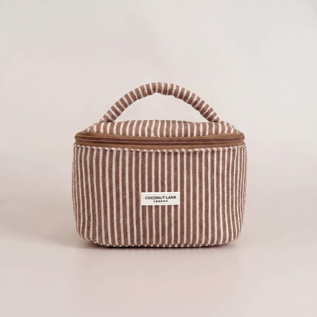 Brown and white stripe small Vanity Bag with zip closure and padded handle.