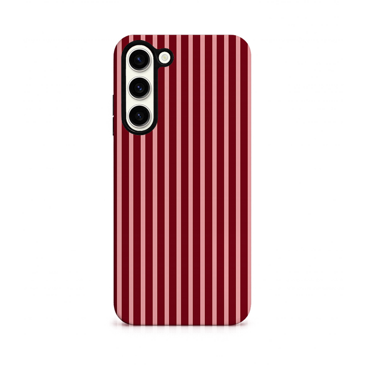 Phone case with red and pink vertical stripes on a white background