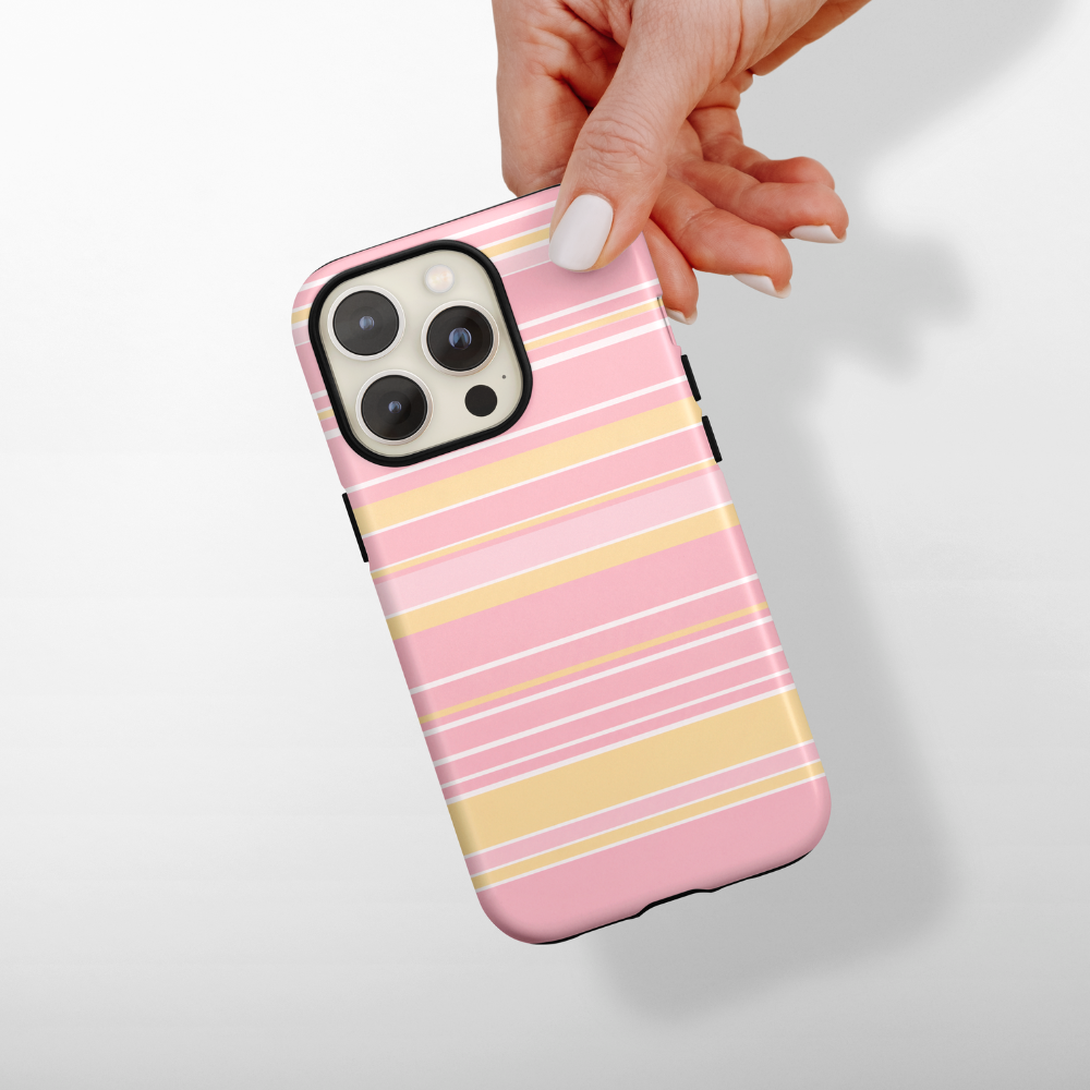 White, pastel pink and butter yellow stripes.