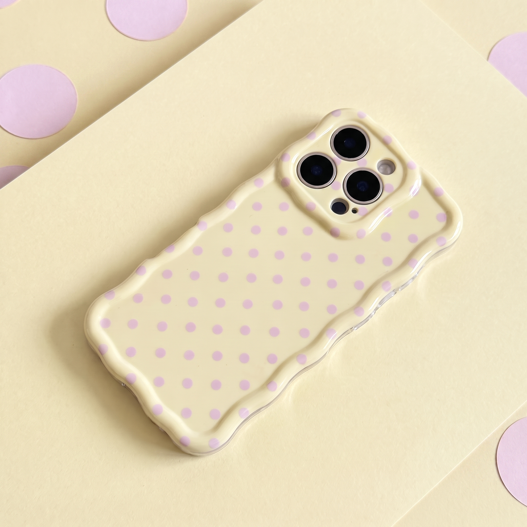 Pale yellow Wavy Phone Case with baby pink polka dots. Designed for iPhone.